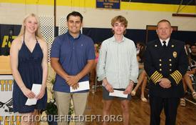 Chief Michael Boken pictured with CFD Scholarship Recipients at Mattituck High School awards ceremony 